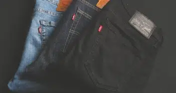 three assorted-color denim bottoms