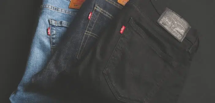 three assorted-color denim bottoms